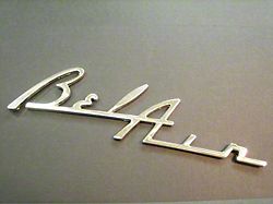 Speaker Script Emblem, Chrome (55-56 Chevy Bel Air)